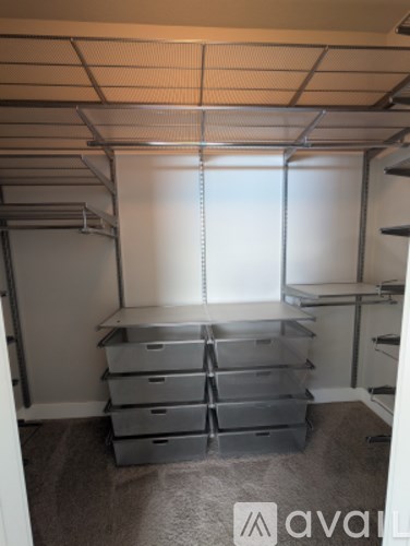 A storage room with shelves and drawers.