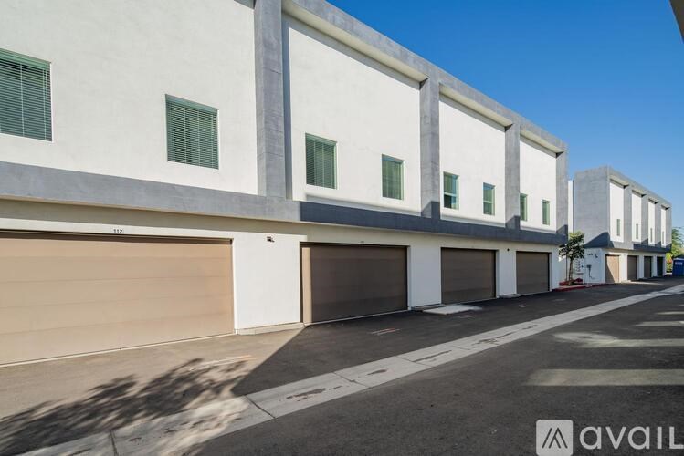 A row of garage doors are closed.