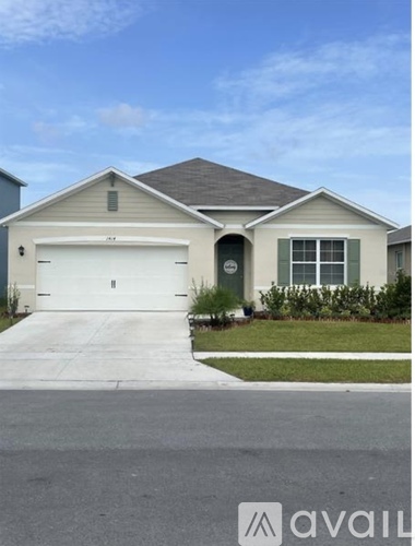 A two-car garage is attached to a house.