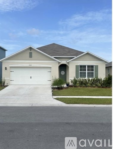 A two-car garage is attached to a house.