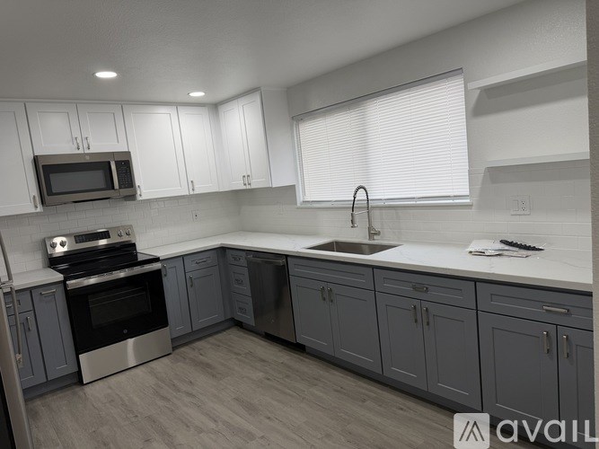 A room with a door and a window.