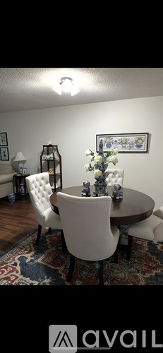 A house with a white door and windows is shown.