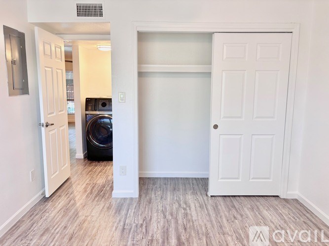 A room with a washing machine in it.