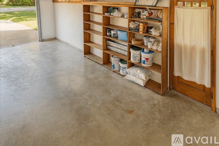A room with a shelving unit filled with various items.