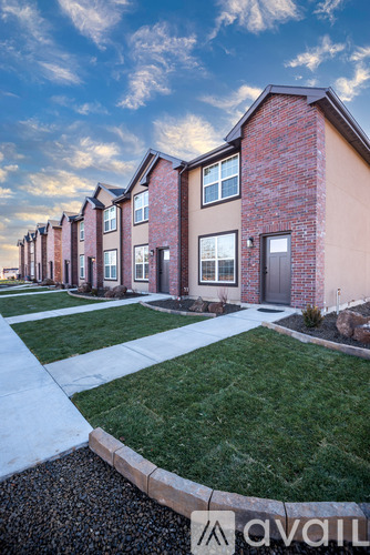 A row of houses with the logo "avail" on the bottom right.