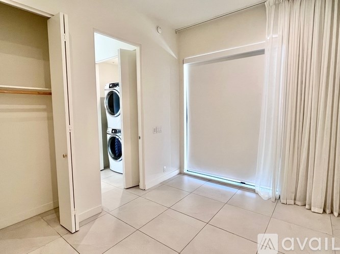 A laundry room with a washing machine and dryer.
