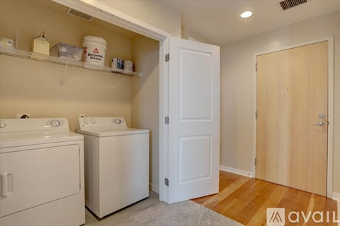 A laundry room with a washer and dryer.