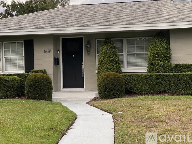 A house with the number 1681 on the front door.