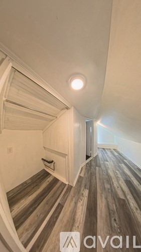 A bathroom with a walk-in shower and a toilet.