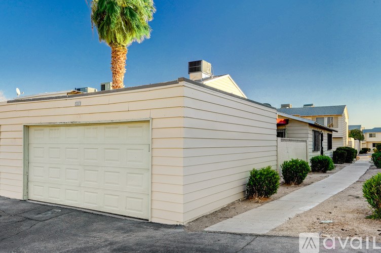 A house with a palm tree on the roof.