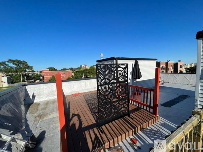 A skate park with a ramp and a metal structure.