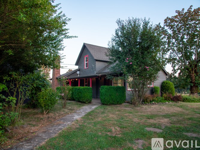 A house with a red letter "E" on the front.