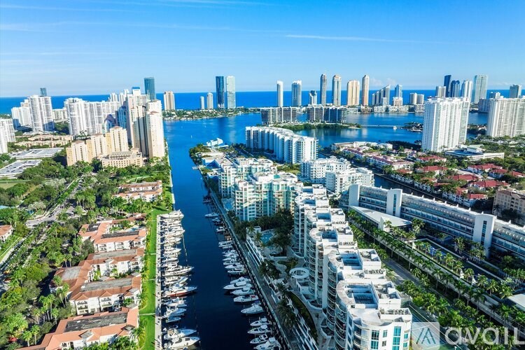 A cityscape with a river running through it.