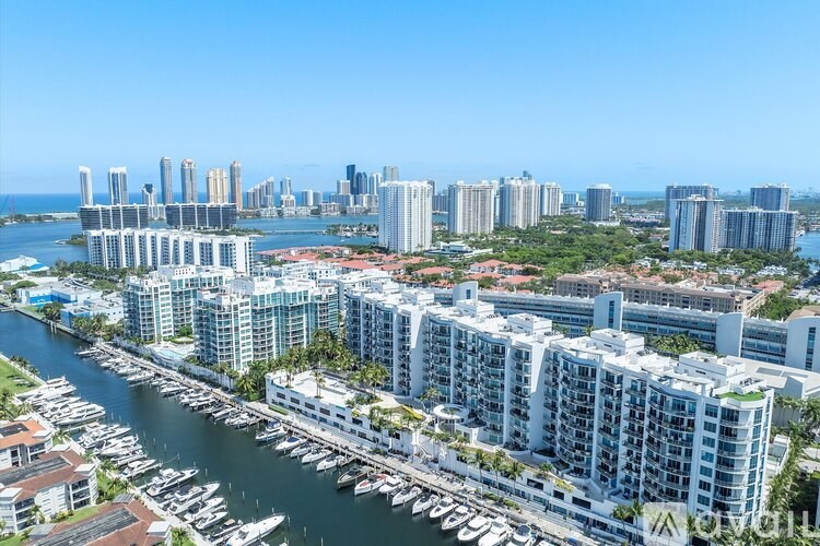 A cityscape with a river running through it.