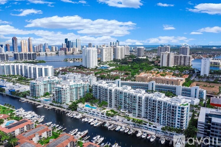 A cityscape with a river running through it.