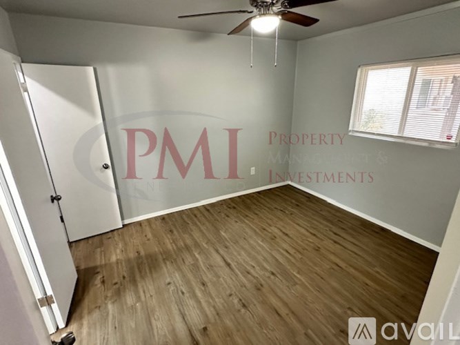 A room with a PMI logo on the wall.