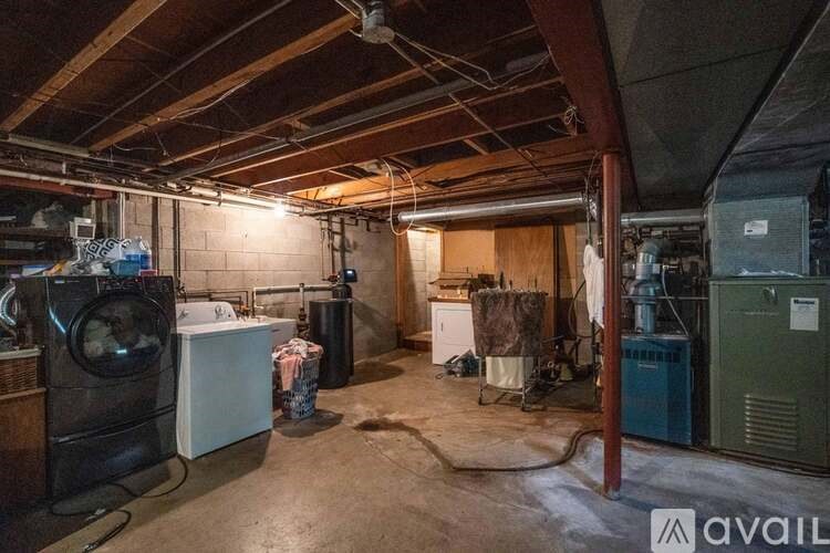A laundry room with a washer and dryer.