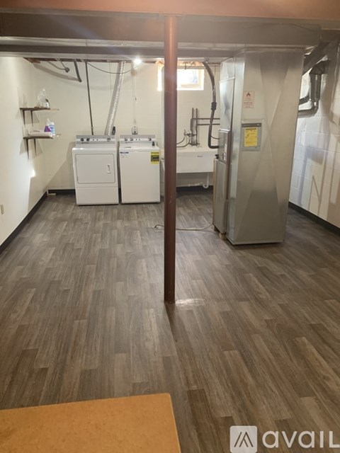 A laundry room with a washer and dryer.