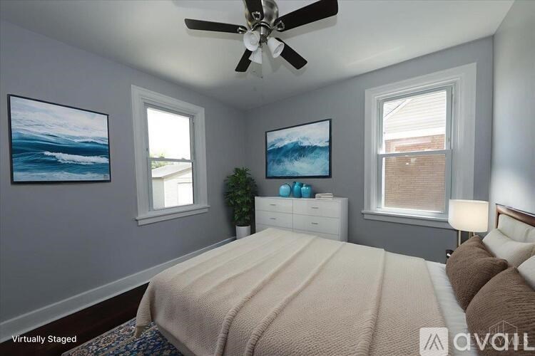 A white door is open to a bathroom.