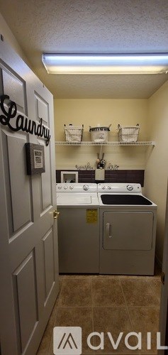 Laundry room with washer and dryer.