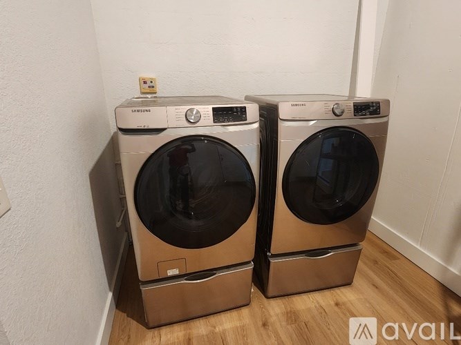 Two Samsung front loading washing machines are available for purchase.