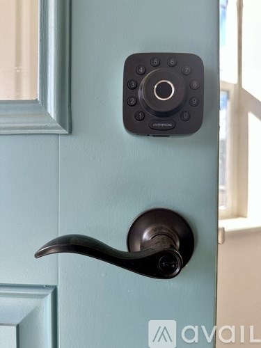 A door handle with a keypad on it.