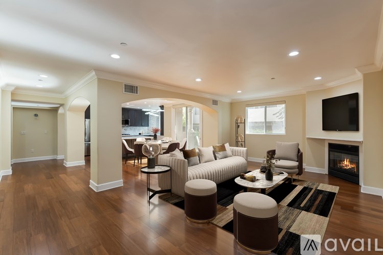 A living room with a fireplace and a couch.