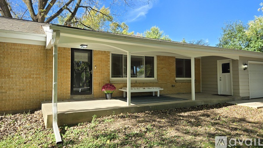 A house with a porch and a sign that says "available".