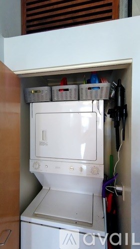 A white dishwasher is installed in a kitchen.