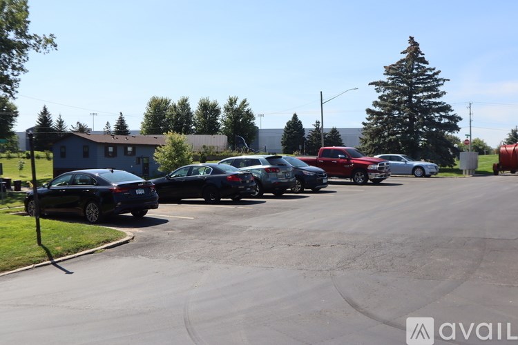 A parking lot with cars parked in it.