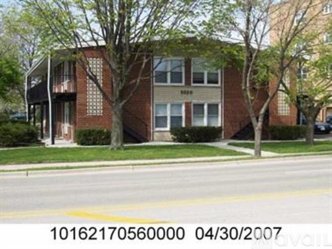 A building with the number 10162170560000 on it.