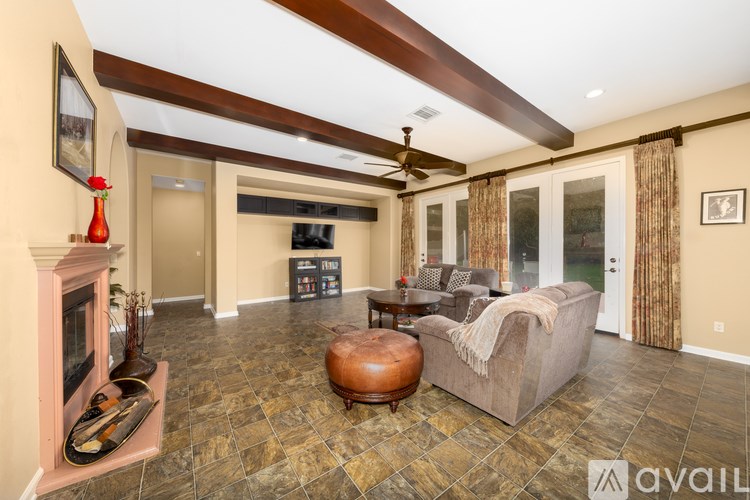 A living room with a fireplace and a couch.