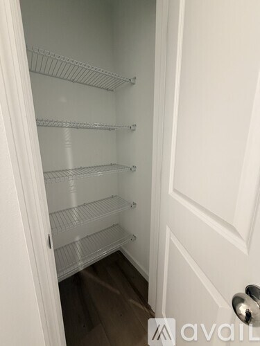 A white door with a handle and Avail logo on it.