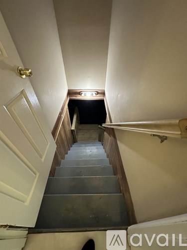 A staircase with a light at the top.
