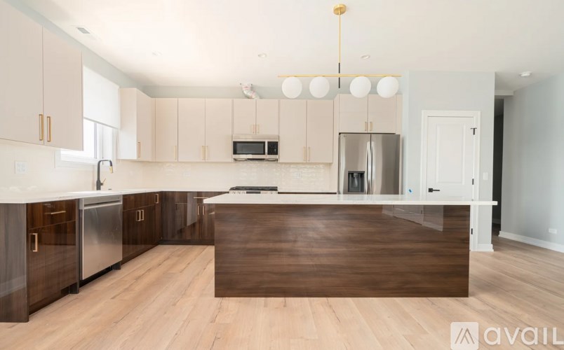 A kitchen with wooden countertops and stainless steel appliances.