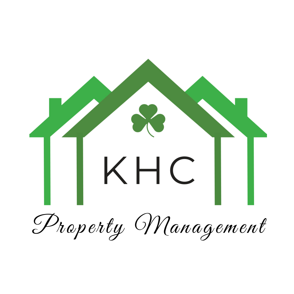 A logo for KHC Property Management featuring a green house with a four-leaf clover.