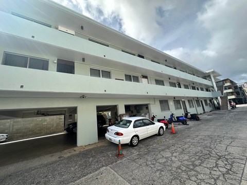 A car is parked in a parking garage.