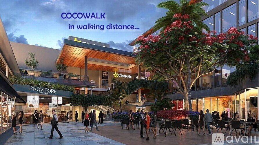 A rendering of a shopping area with the text "COCOWALK in walking distance..." displayed.