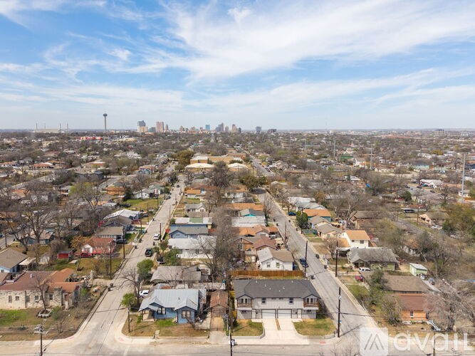 A suburban neighborhood with houses and streets.