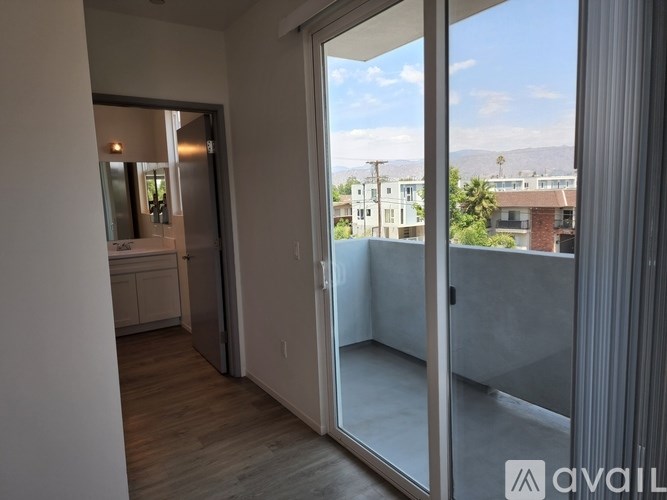 A balcony with a view of the cityscape.