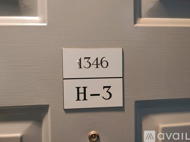 A door with a sign that reads 1346 H-3.