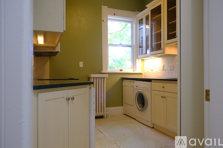 A laundry room with a washer and dryer.