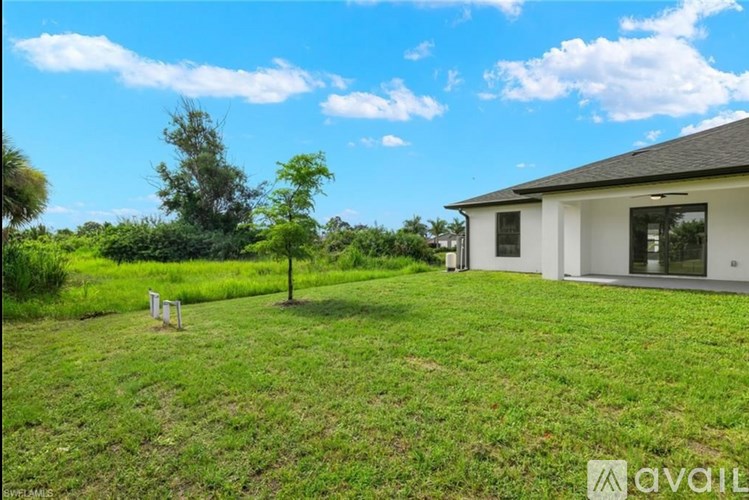 A house with a lawn in front of it is for sale.