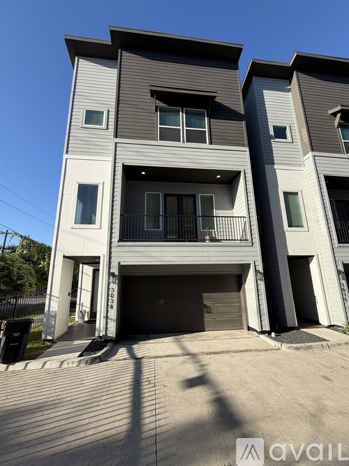 Two modern houses with garages are available for rent.