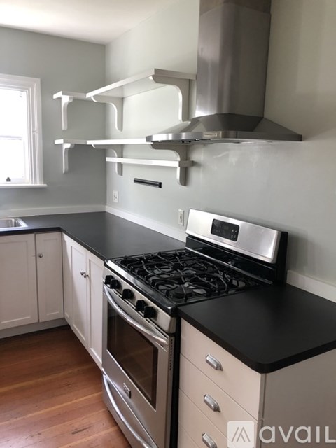 A kitchen with a stove and oven.