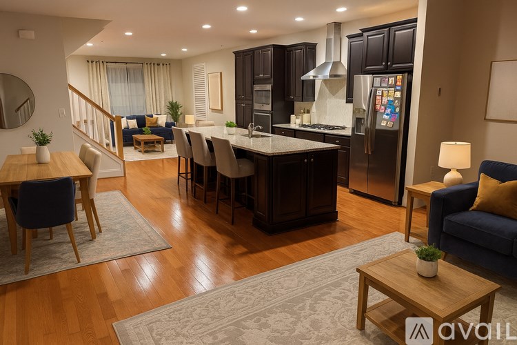 A modern kitchen with dark wood cabinets and a central island.