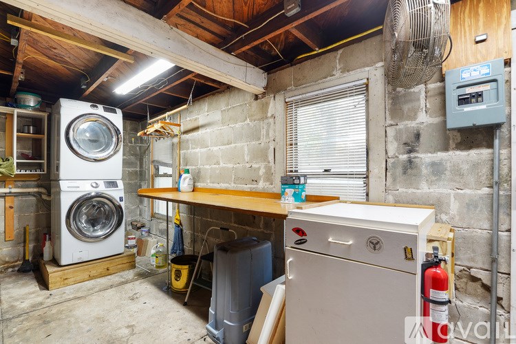 A laundry room with a washer and dryer.