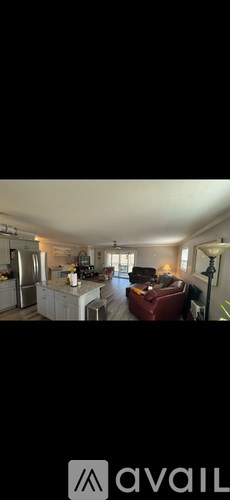 A living room with a couch and a coffee table.