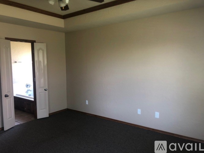 A room with a door and a window.