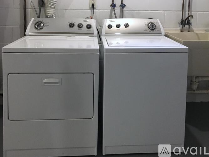 A white oven and sink in a kitchen.